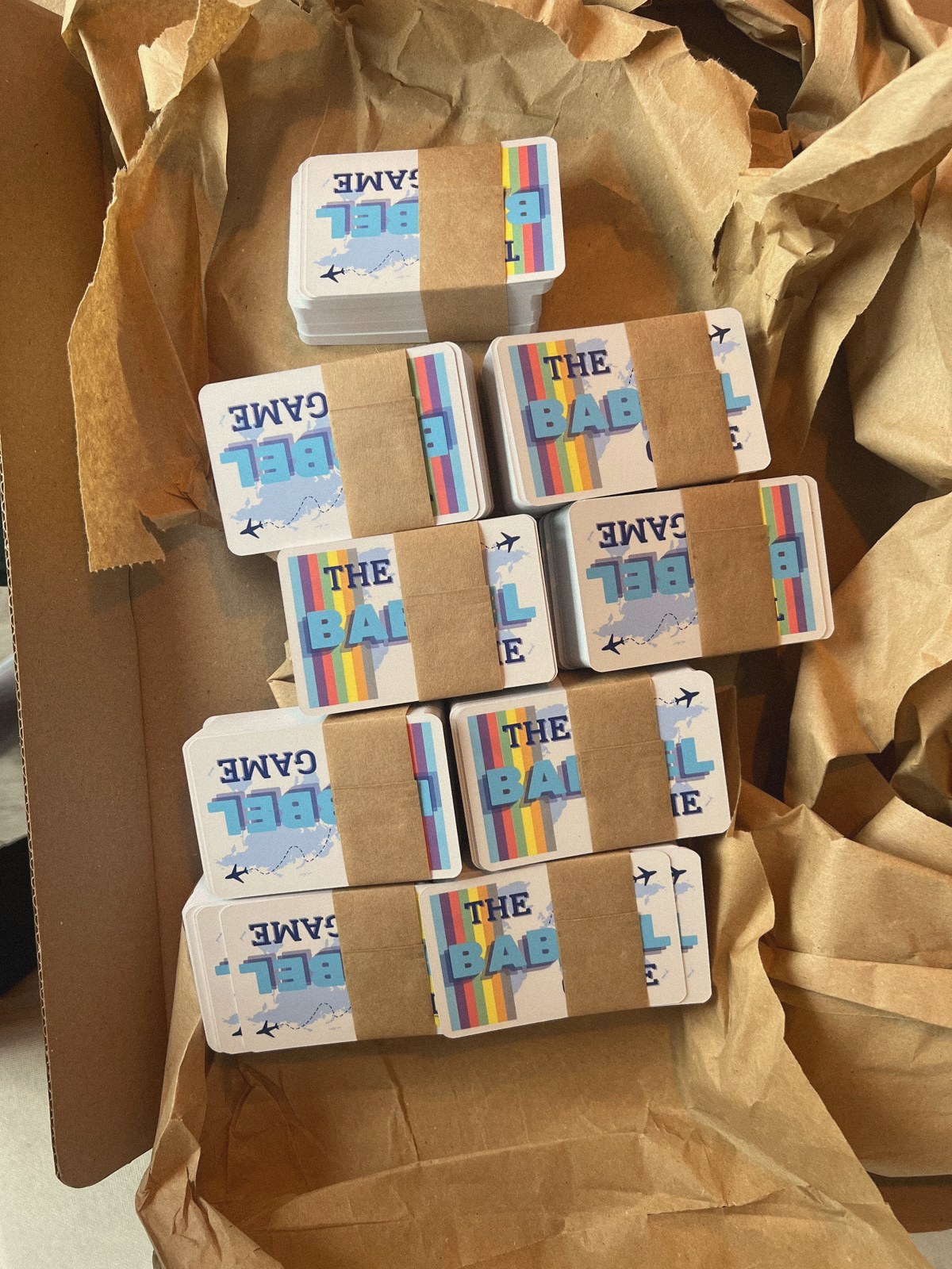 The first ten Babbel Game boxes packed in a cardboard shipping box